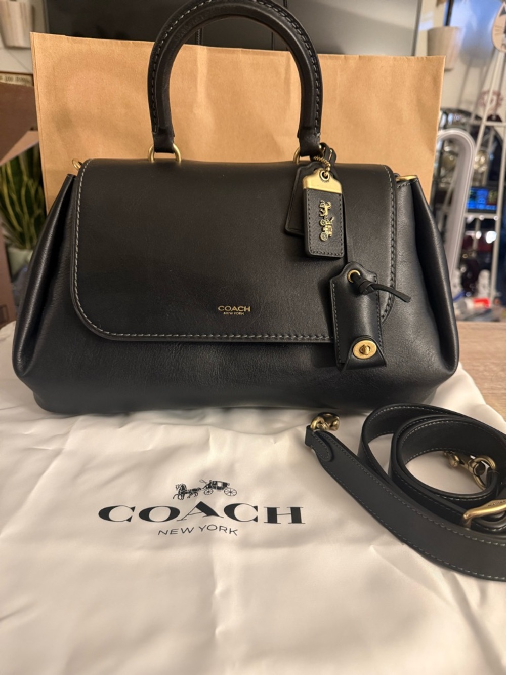 NWOT Coach Black Slouchy Rogue 39